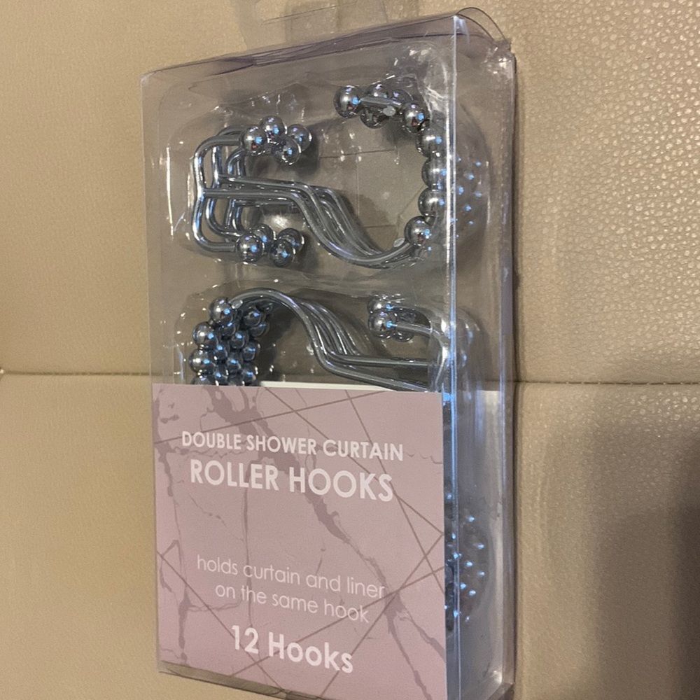 Double shower curtain roller hooks.  See all photos for complete description